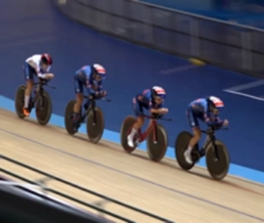 Cyclists in a velodrome